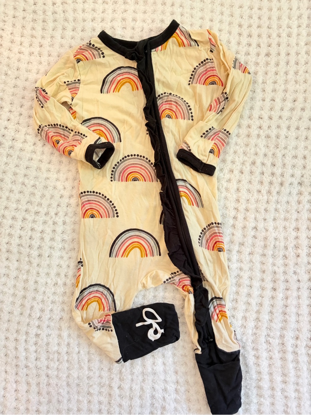 Cream Rainbow Print Footed One-Piece for Kids with Black Trim